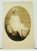 RPPC Girl Big White Hair Bow Seated on Sheep or Goat Fur Long Island Postcard I8 - £10.32 GBP