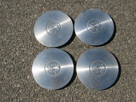 Genuine 1985 to 1988 Mercury Cougar wheel center caps hubcaps E5WC-1A097-BA - $37.05