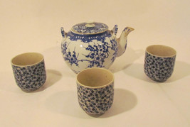 Blue and White Flower Tea Pot and Three Tea Cups - $18.98