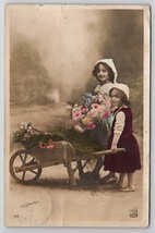 RPPC Darling Young Girls Wheelbarrow of Flowers Studio Real Photo Postcard Y25 - £3.10 GBP