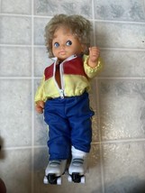 12&quot; 80&#39;s vintage hard plastic doll with roller skates works wind suit bl... - £29.06 GBP