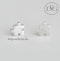 ModaOne 925 Sterling Silver Stylish Puzzle Piece Theme Stud Ladies earrings - $6.99