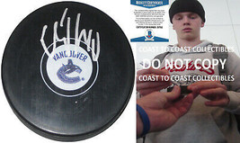 Elias Pettersson signed Vancouver Canucks logo Hockey Puck proof Beckett... - $98.99