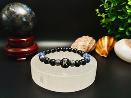 Aquarius Gemstone Bracelet: Lapis Lazuli, Sodalite, Black Zodiac Charm - $26.94