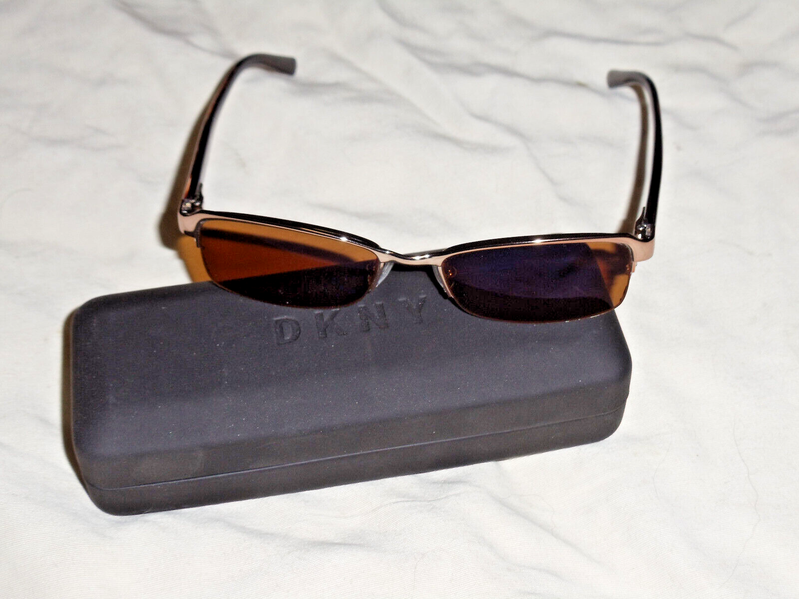 DKNY semi rimless eyeglass frame with polarized sun glass lenses  New Case with  - $49.99