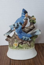 Two Bluebirds on Flower log 7 Inch White Base Figurine - £11.60 GBP