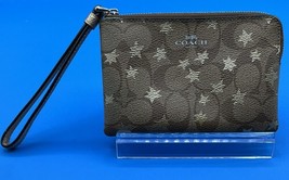 A Cute Coach Brown Corner Zip Wristlet In Signature Canvas With Pop Star Print - $24.26