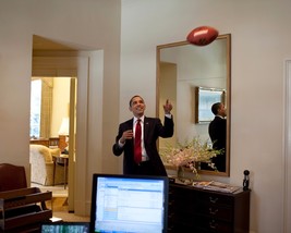 President Barack Obama tosses a football outside the Oval Office Photo Print - £7.06 GBP