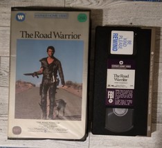 The Road Warrior Warner Clam Case Mel Gibson Mad Max 2 Post-Apocalyptic - £14.90 GBP