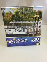 * PUZZLEBUG* 500 Piece Jigsaw Puzzle "Old Steamboat Docked". Size 18.25" x 11" - $9.65