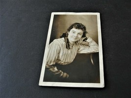 Young Lady smiling and sitting on a Chair-RPPC-Stamp Box-AZO (1918-1930). - £7.15 GBP