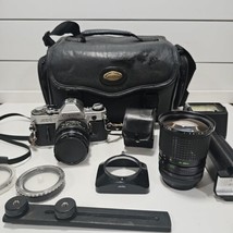Canon Film Camera AE-1 Program 35mm SLR With 3 Lens Kit Case And Flash - $193.00