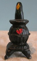 Vintage  Cast Iron pot bellied stove black  Flower Salt and Pepper Shaker - £11.56 GBP
