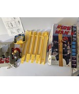 VINTAGE FIREFIGHTER GOES UP AND DOWN LADDER MAN TOY BATTERY OPERATED  - €102,94 EUR