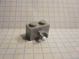 Lego Part #30237b: Light Bluish Gray- Modified 1x2 Brick w/ Vertical Open O-Clip - £0.07 GBP