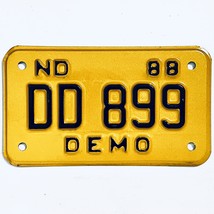 1988 United States North Dakota DEMO Special License Plate DD 899 - $18.80