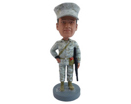 Custom Bobblehead Fierce looking soldir with his machine gun and a toy on the wa - £69.84 GBP