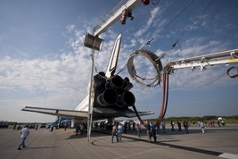 KSC personnel work on Space Shuttle Atlantis after landing STS-135 Photo Print - £6.93 GBP+