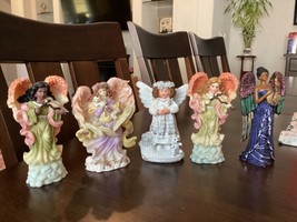 5 Angel Figurine statues - $27.09 CAD