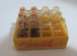 Coca-Cola Miniature Plastic Yellow Case with  8 Plastic Bottles - $2.48