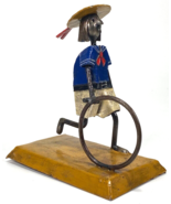 MANUEL FELGUEREZ METAL FOLK ART SCULPTURE YOUNG BOY ROLLING A WHEEL MEXICO - $135.58