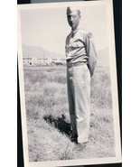 Vintage Soldier Standing in Grass Apartments In The Background  Snapshot... - $4.99