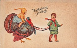 Thanksgiving Greetings~Boy Leads Girl Riding Turkey Postcard - £6.59 GBP