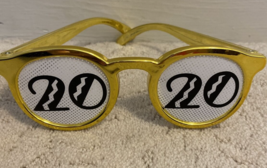 2020 novelty gold plastic glasses - £5.58 GBP