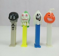 Vtg Lot of 4 Halloween Pez Dispensers Black Skull, Jack O&#39;Lantern, Ghost,&amp; Ghoul - £8.57 GBP