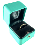 Authenticity Guarantee

Tiffany &amp; Co. 18k Yellow Gold Lock Ring Size 7.2... - $3,564.00