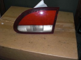 Right Tail Light Lid Mounted Green 2Dr OEM 1995 1996 97 98 99 Chevrolet Caval... - £7.65 GBP