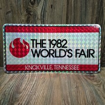 VTG 1982 WORLD&#39;S FAIR License Plate Tag Knoxville Tennessee Sunsphere Red - £19.46 GBP