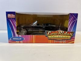 1963 Chevy Impala Drop Top New In The Box in 1/24 Scale Diecast by Welly - $24.75