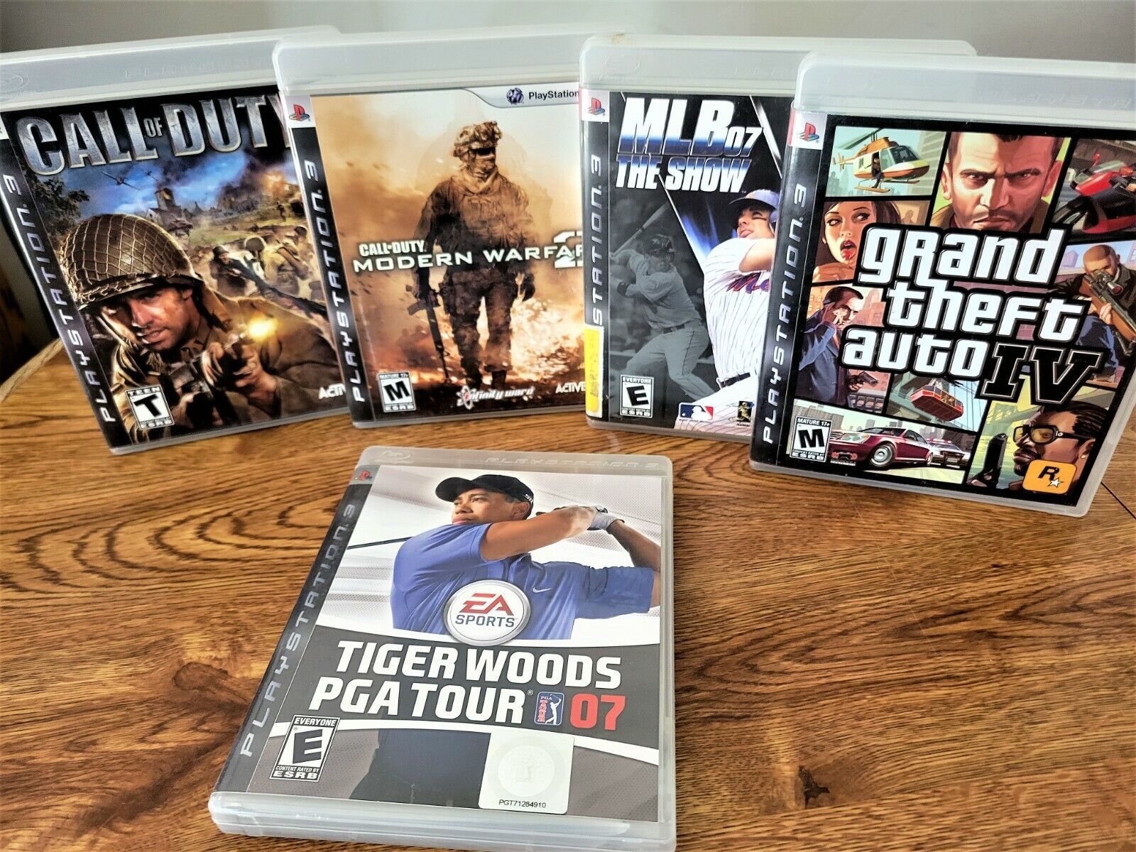 Primary image for PS3 Game Lot of 5 Complete GTA-IV Call of Duty 3, Mod. Warfare2, MLB07, Tiger07