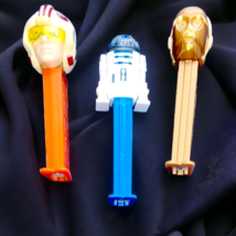 VINTAGE A LOT OF 3 OFFICIALLY LICENSED STAR WARS PEZ DISPENSERS - $102.51 MXN