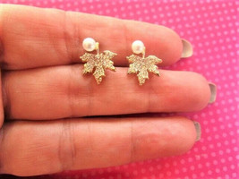 Maple leaf crystal pearl studs - $11.88