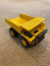 Vintage 1988 Remco Toy Metal Dump Truck Yellow Goodyear Tires - £11.68 GBP