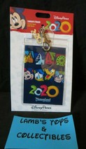 Disney Parks Authentic Lanyard Pouch ID Passholder card holder 2020 with charm - $10.66