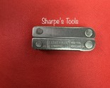 Retired Leatherman Mini-Tool, pliers, knife, screwdriver, file, wire cut... - $110.56