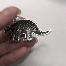 Triceratops Rhinestone Brooch Green and Silver Tone - $11.30