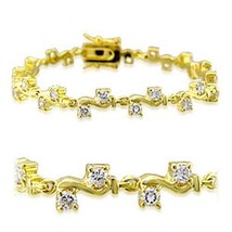 32006 - Gold Brass Bracelet with AAA Grade CZ  in Clear - $573.94 MXN