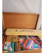 Wooden Box full of Fun Brain Teaser Games  - $41.03 CAD