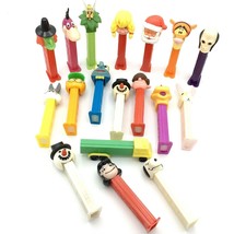 PEZ dispenser 18 mixed characters - Disney Garfield Peanuts Muppets holiday - $18.00
