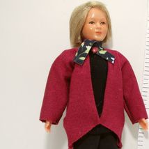 05 0185 lady draped red cardigan over black  scarf  blond 4 thumb200