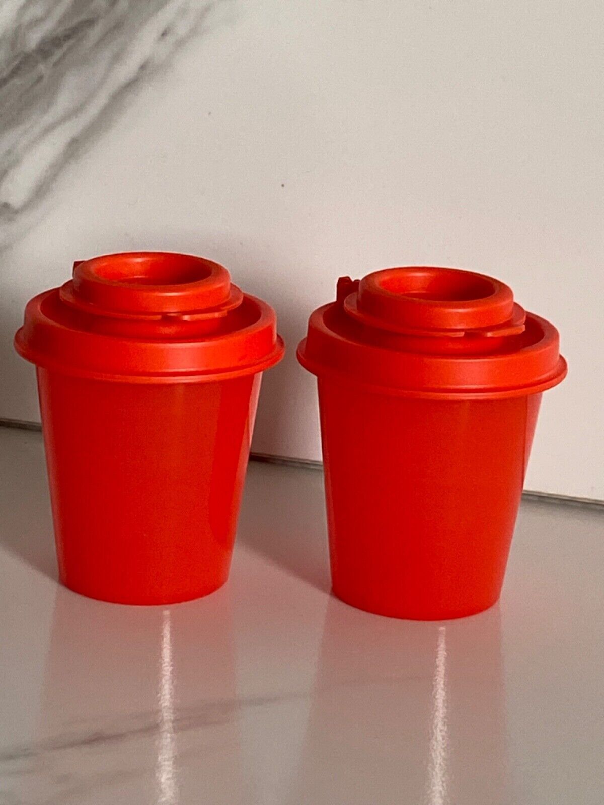 Orange Tupperware Personal Mini Salt & Pepper Shakers 2-oz Kitchen Travel Set - $11.09