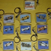 9 Aurora AFX G+ Formula 1 Slot Car Key Chain Set 1980&#39;s - $19.99