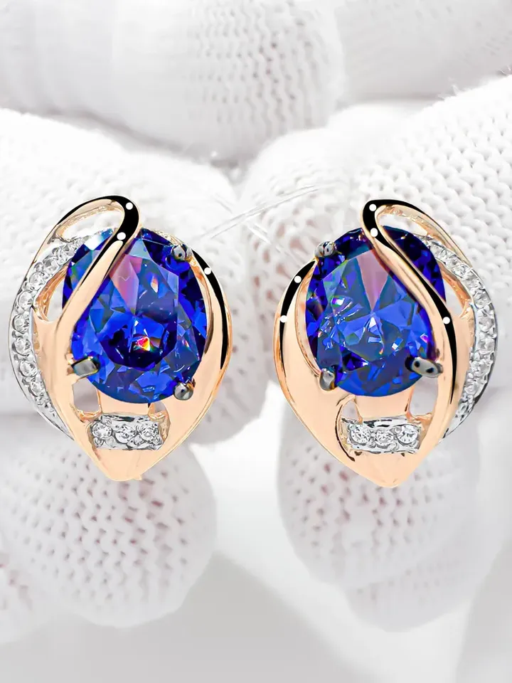 Earrings made of 925 silver (585 gold plated) with tanzanite and white c... - $125.00