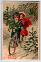 Christmas Postcard Children On Bicycle Boy Girl Embossed Germany Snow BW... - $22.80