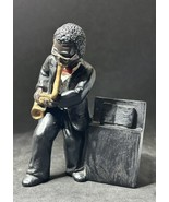 Vintage Enesco Parastone Saxophonist Player 12cm Figurines - $459.96 MXN