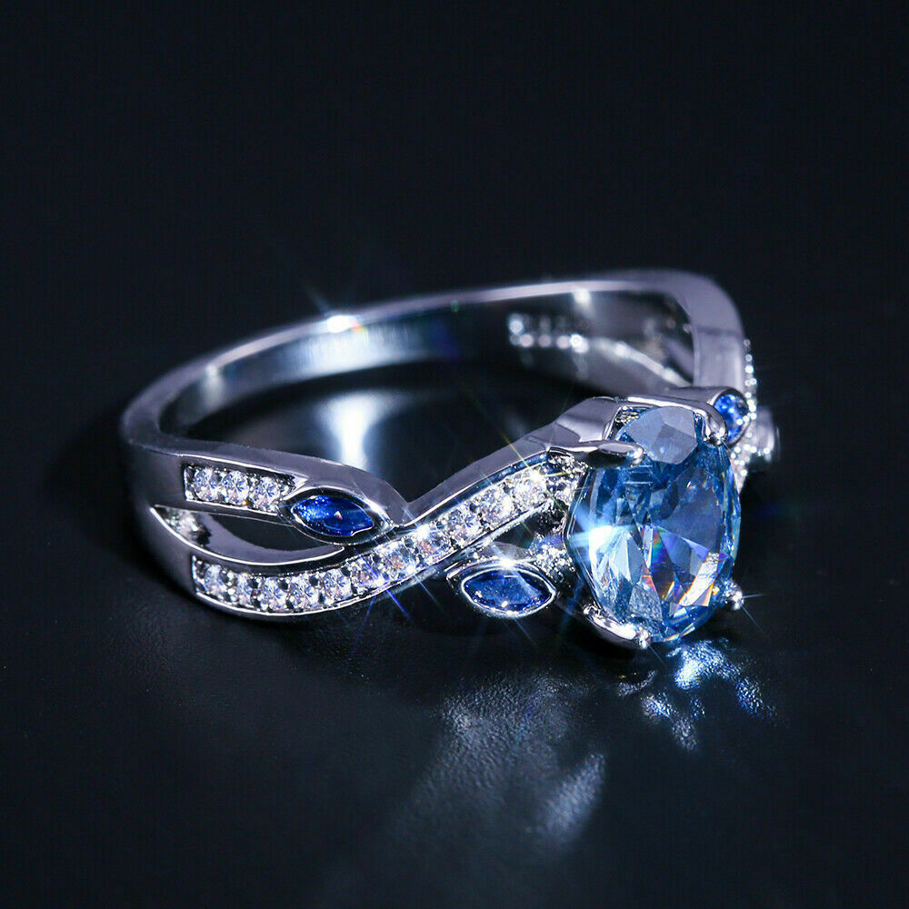 2.00Ct Oval Cut Blue Sapphire 925 Sterling Silver Cross Leafy Engagement Ring
